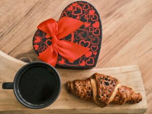 Coffee subscription box with bags of specialty coffee and brewing accessories