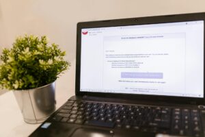 Laptop screen showing multiple notification alerts for online review monitoring and social media management