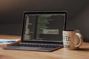 Clean laptop workspace setup for digital community management and Discord server administration