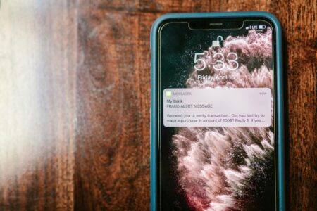 Smartphone displaying social media notifications and comments interface