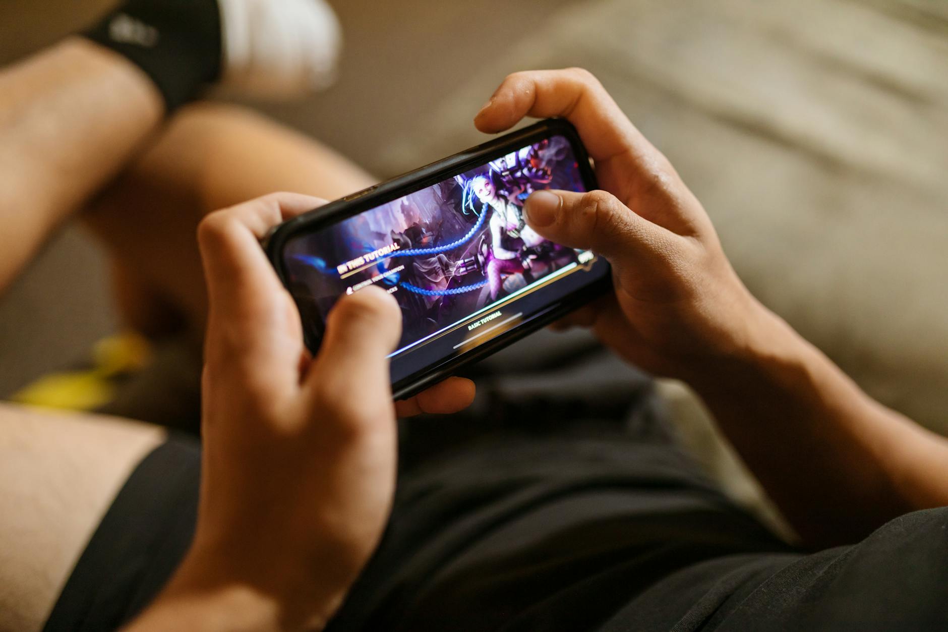 Close-up view of mobile app interface showing gamification elements like points and progress bars