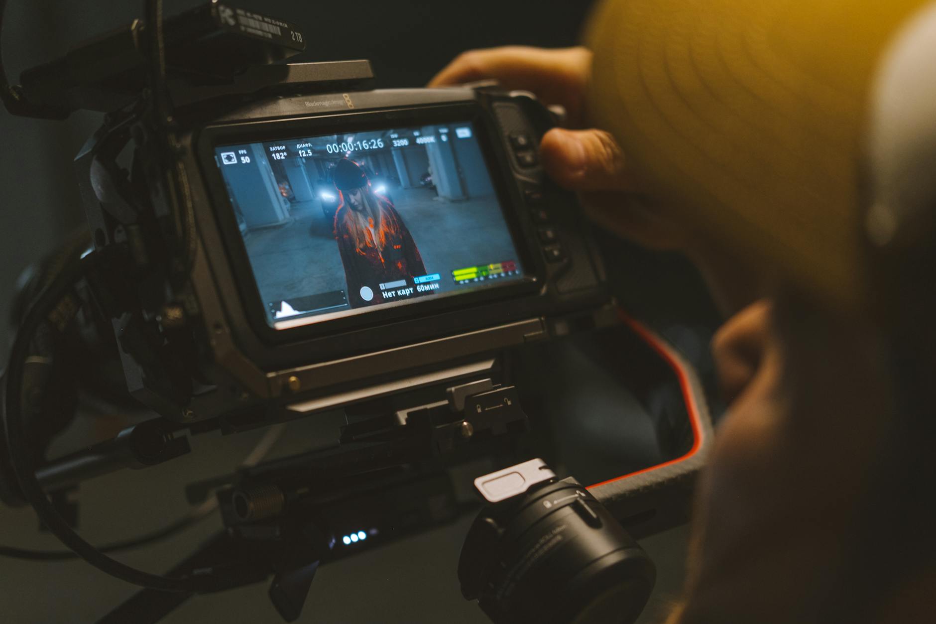 Someone recording video content with mobile phone for social media