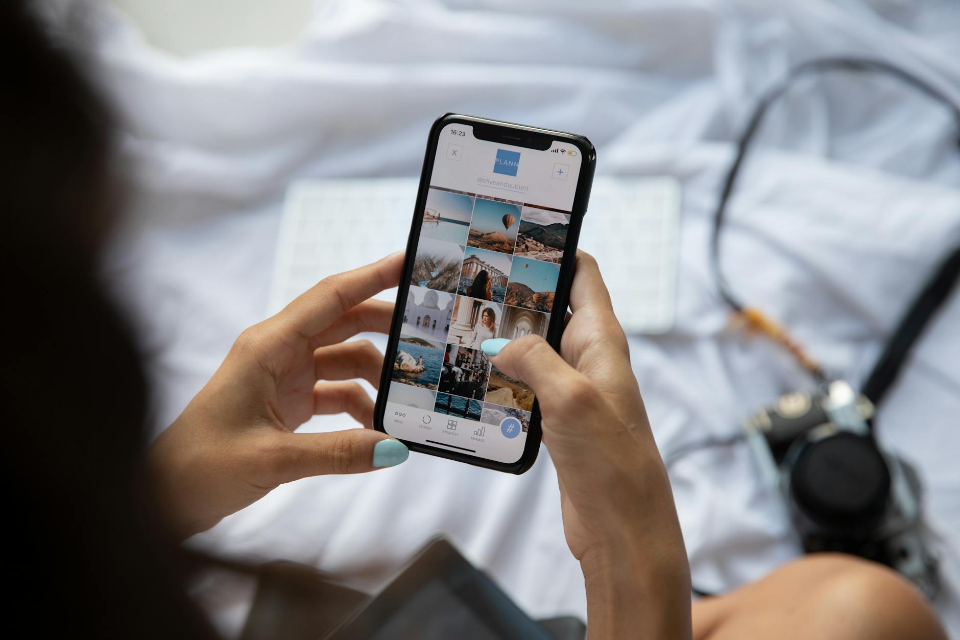 Smartphone displaying multiple social media apps including TikTok, Instagram, and Twitter arranged on home screen