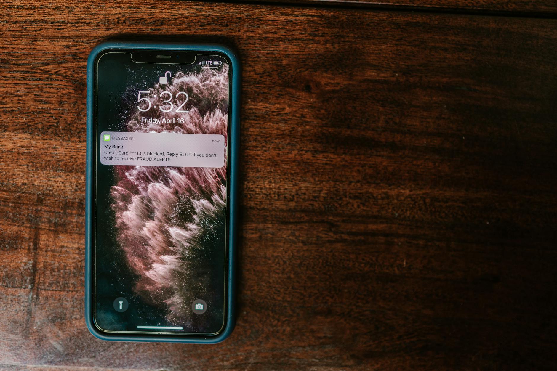 Smartphone displaying social media notifications and comment alerts on screen