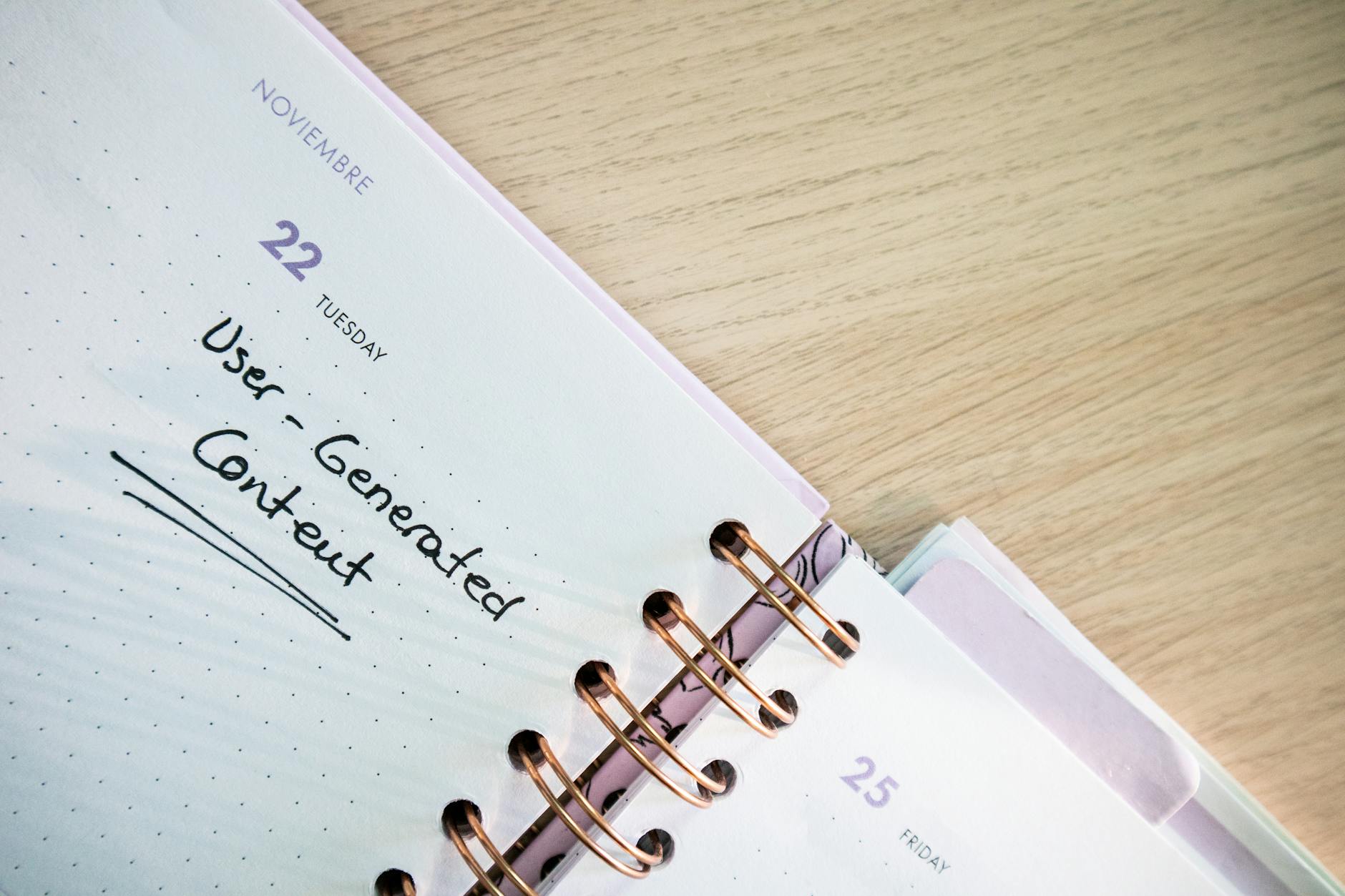 Desktop workspace with content planning calendar and sticky notes