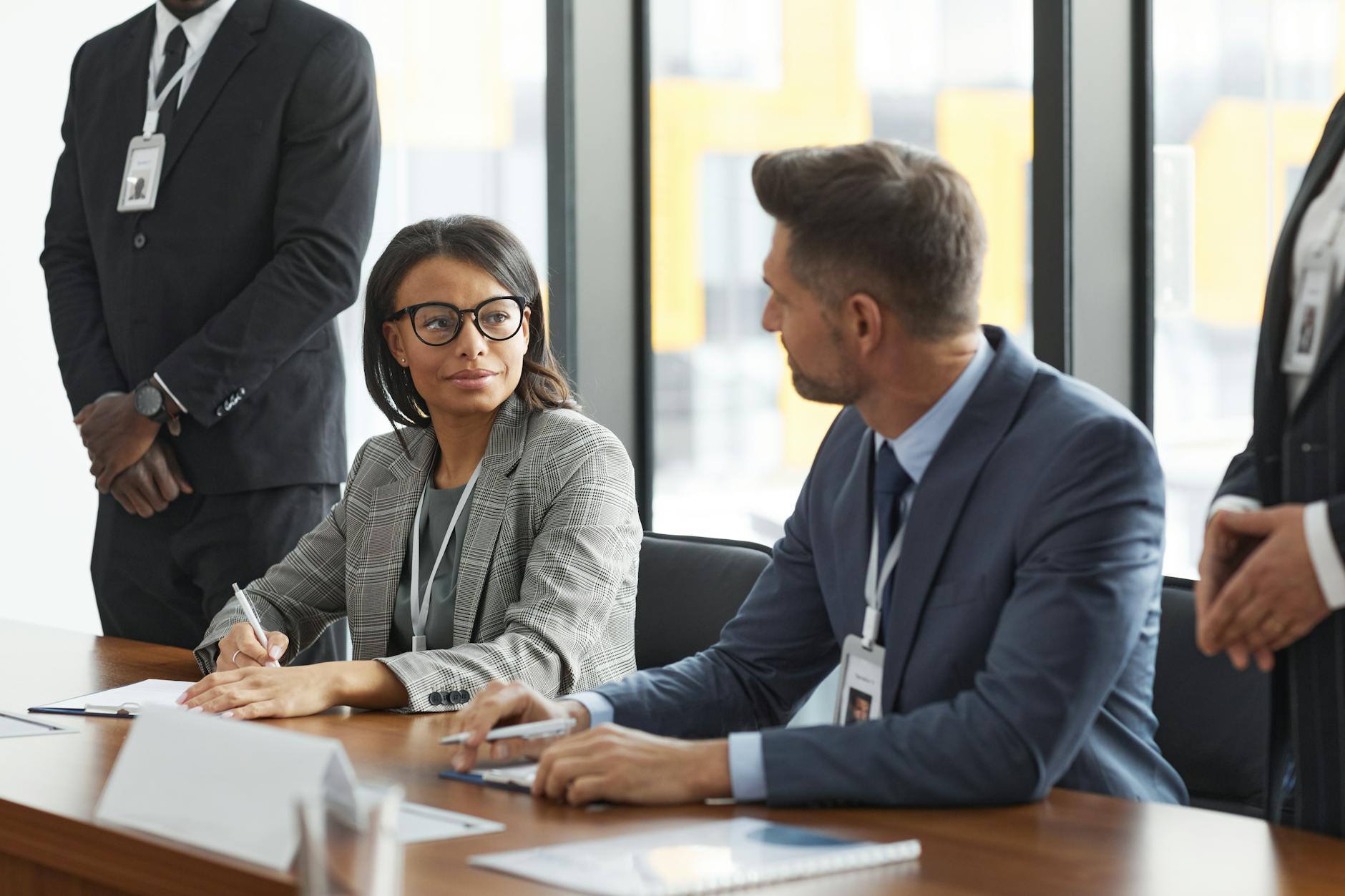 Business professionals in meeting discussing marketing strategy