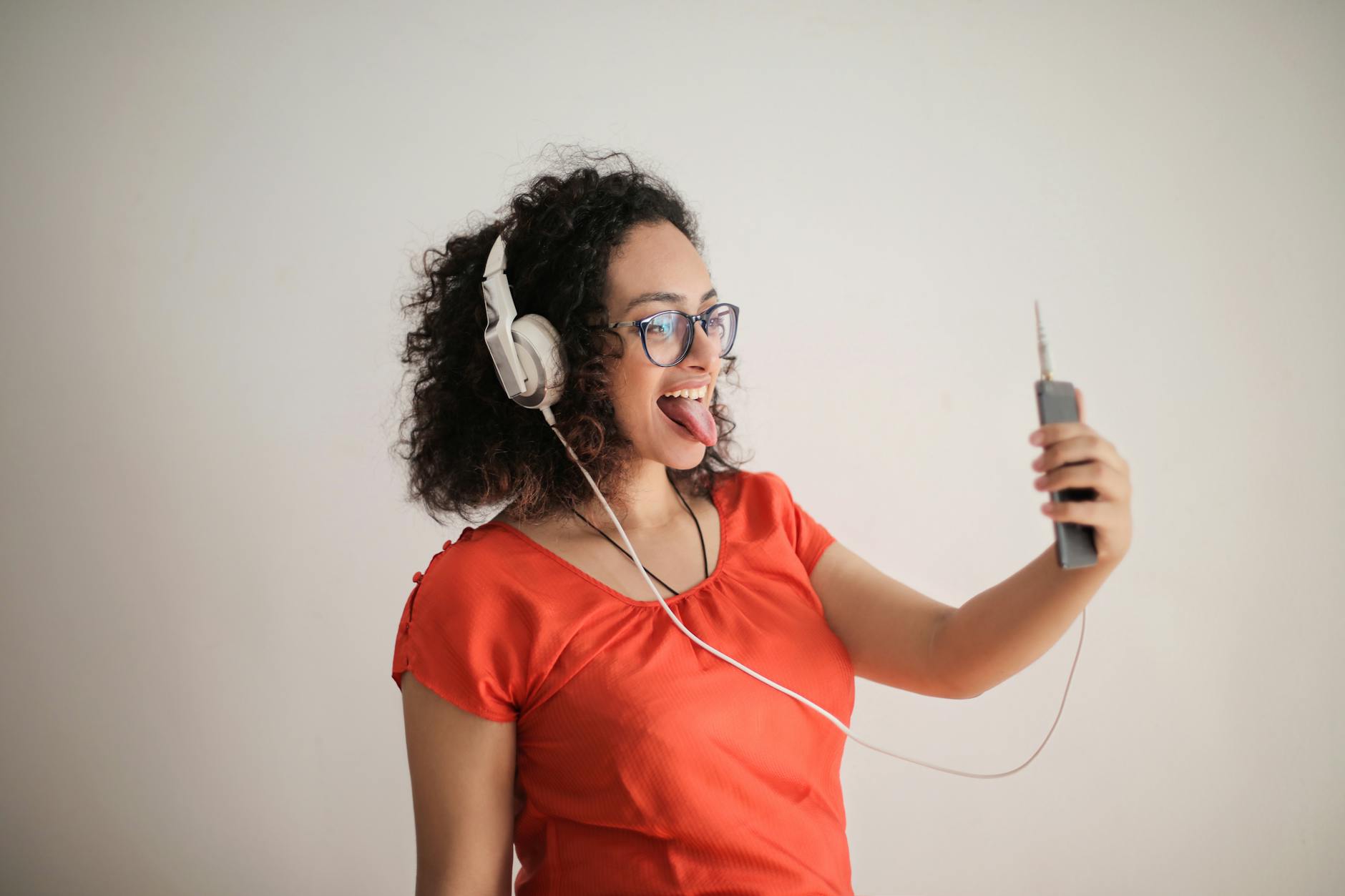 Smartphone with earphones for mobile audio listening experience