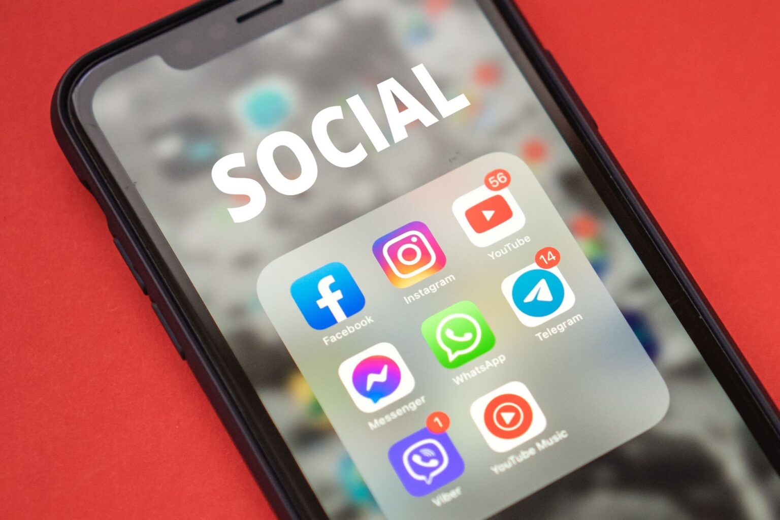 YouTube’s Community Tab Is Quietly Replacing Brand Blog Comments Person scrolling through social media content on a smartphone
