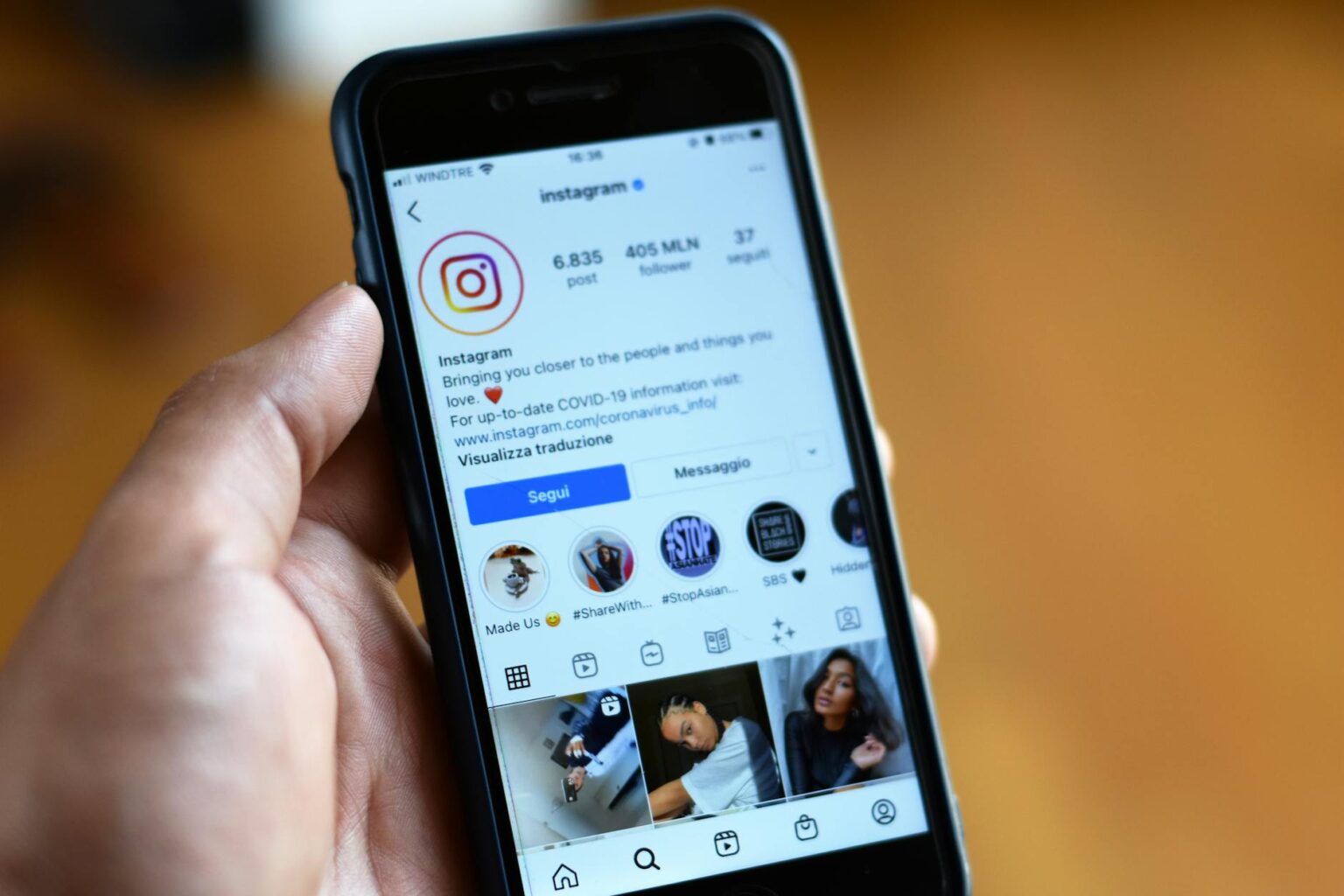 5 Free Shopify Apps That Turn Product Reviews Into Instagram Stories Smartphone displaying Instagram Stories interface with colorful story highlights