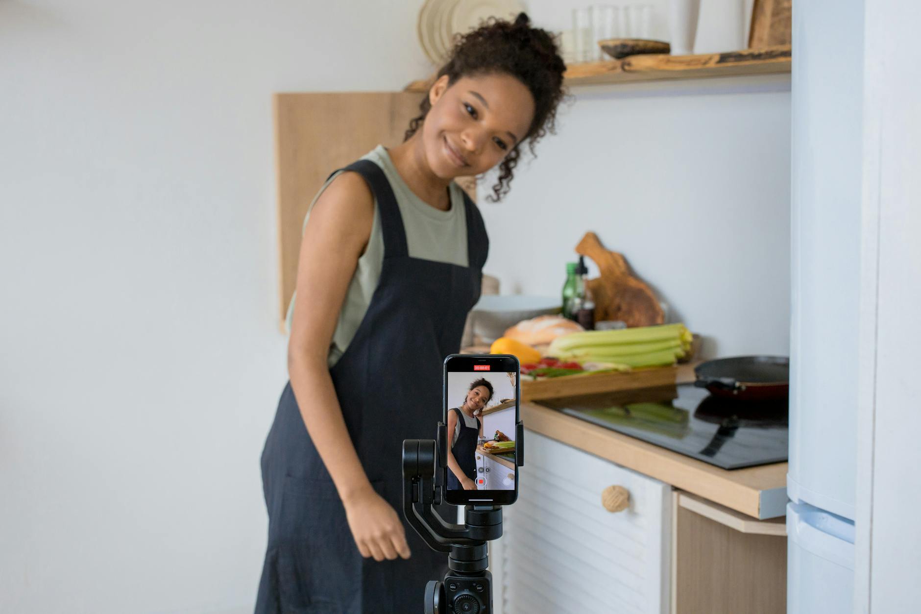 Content creator filming a short video in a studio environment
