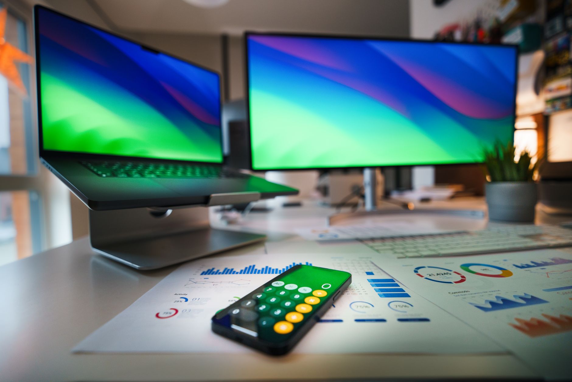 A person working on a laptop with multiple tabs open showing a content workflow