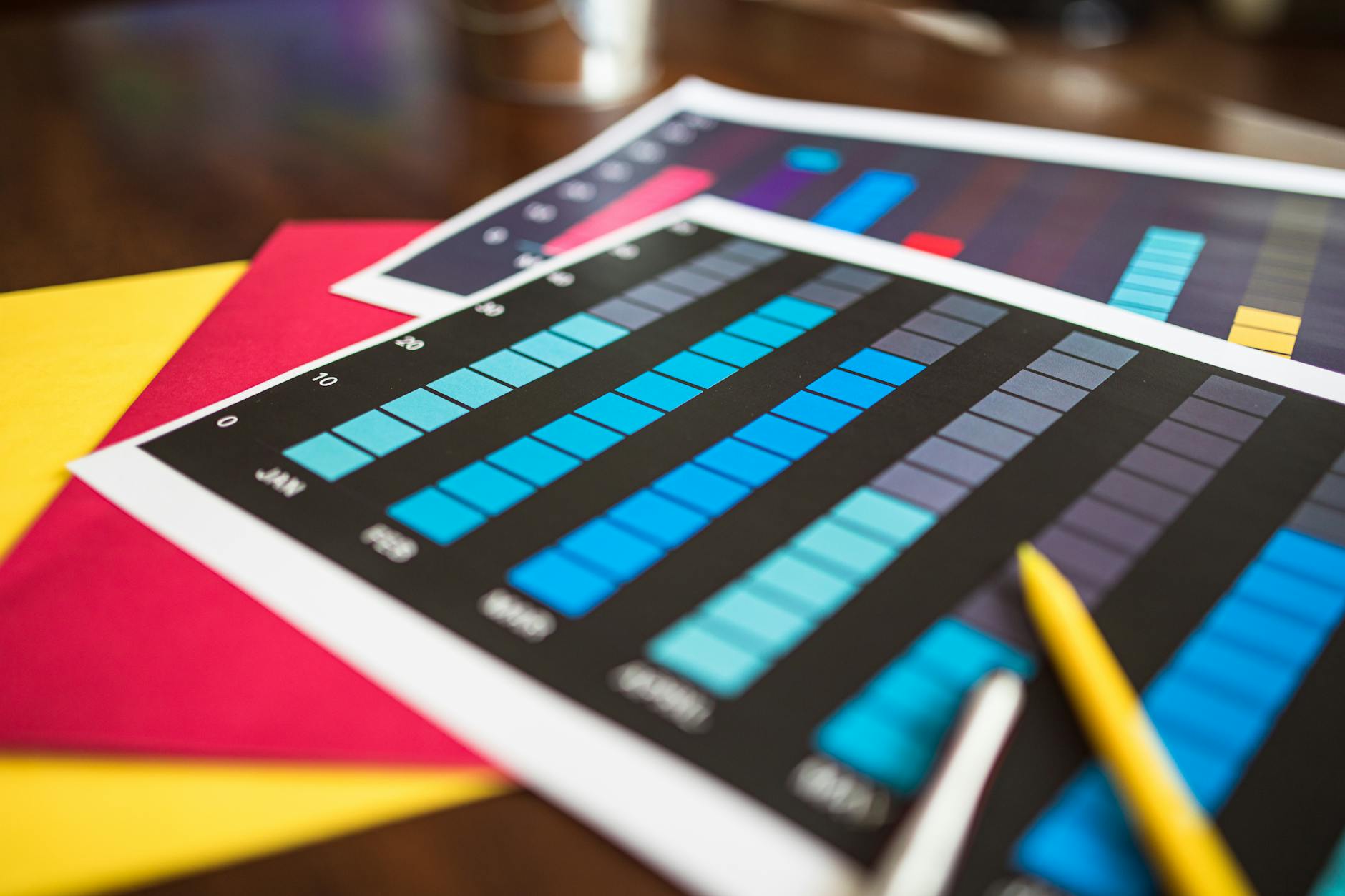 Social media performance metrics visualized on a tablet screen with charts and follower data