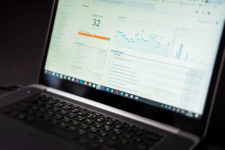 A computer screen displaying a detailed analytics dashboard with graphs and performance metrics
