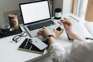 A writer working on a newsletter at a clean desk workspace