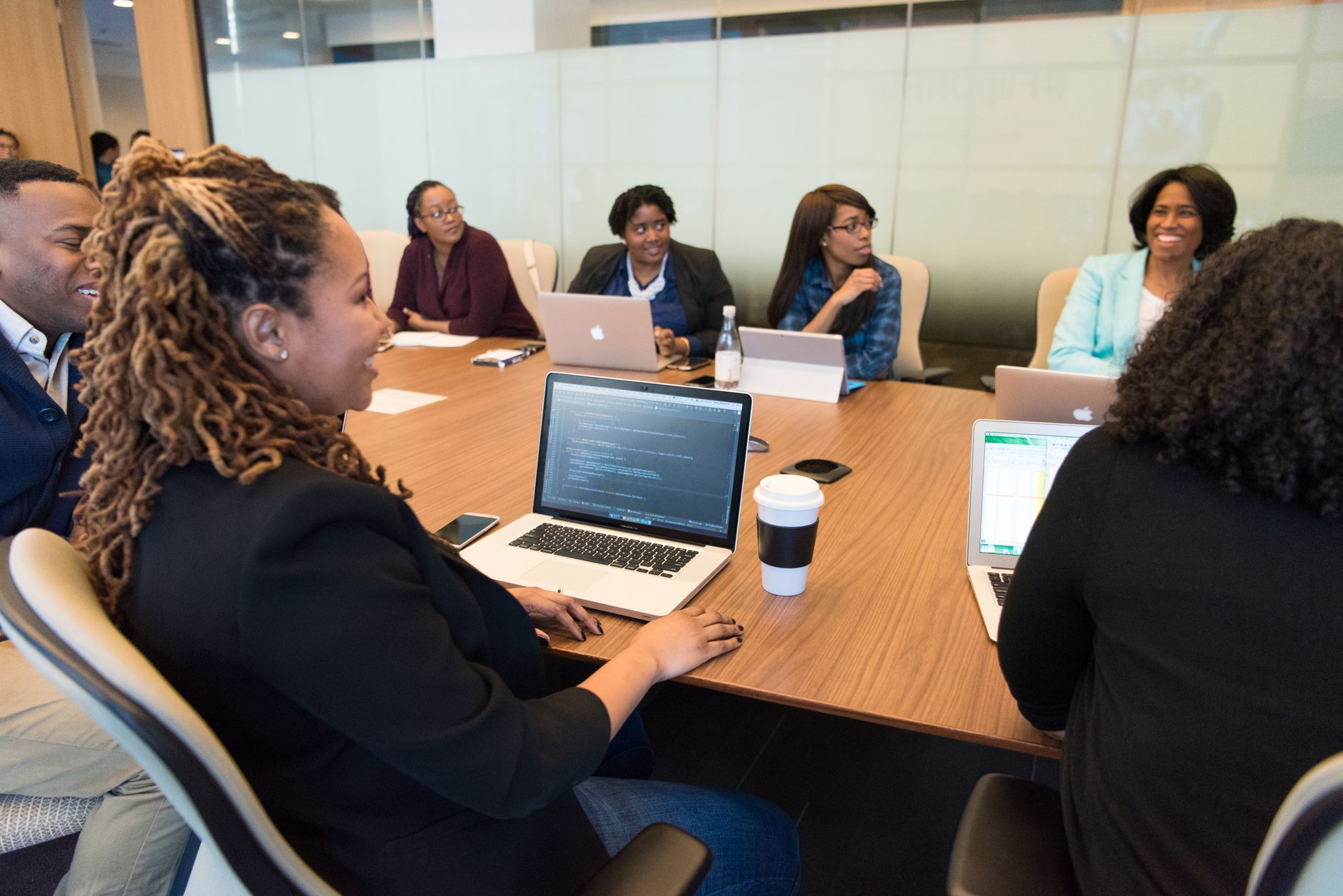 Small agency team reviewing documents together after a client strategy call