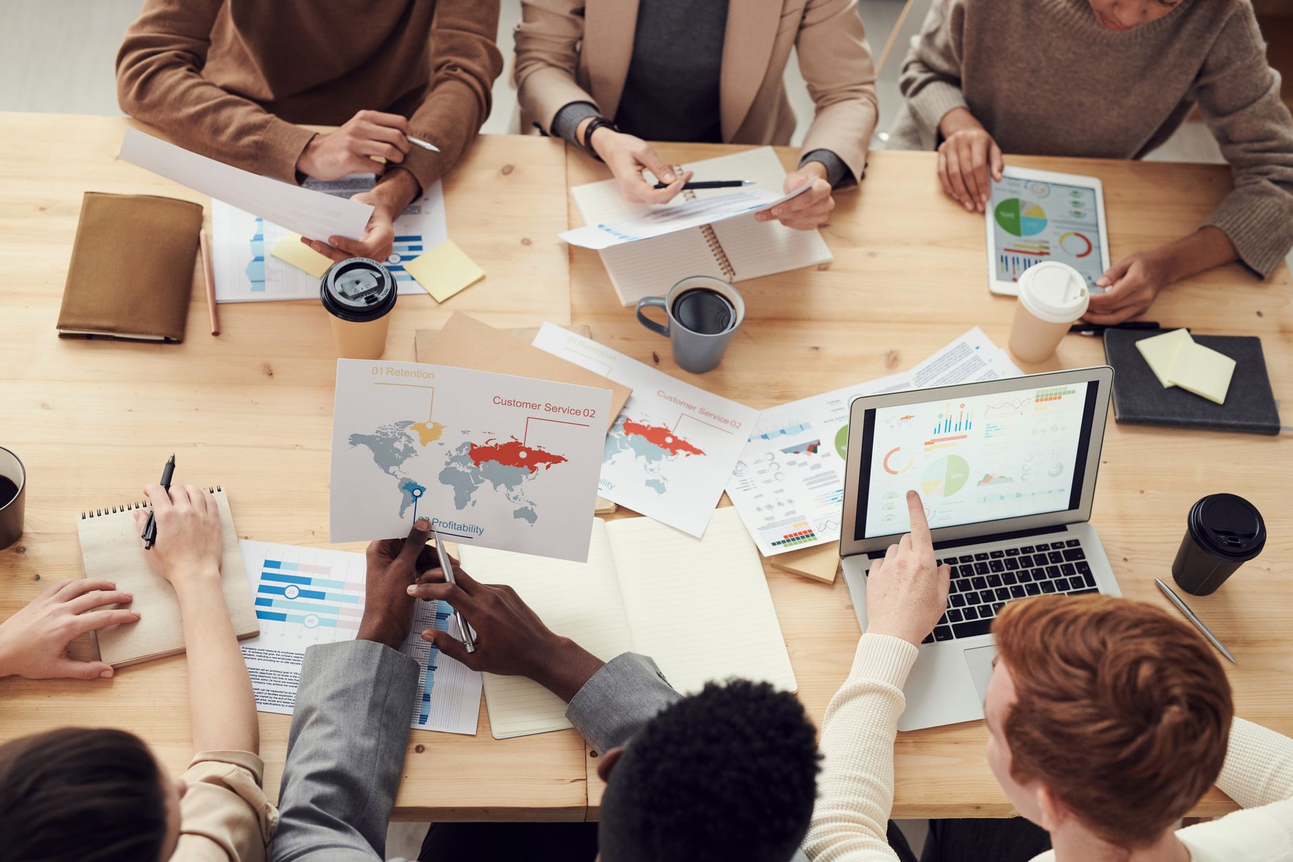 A marketing team reviewing slides during a meeting