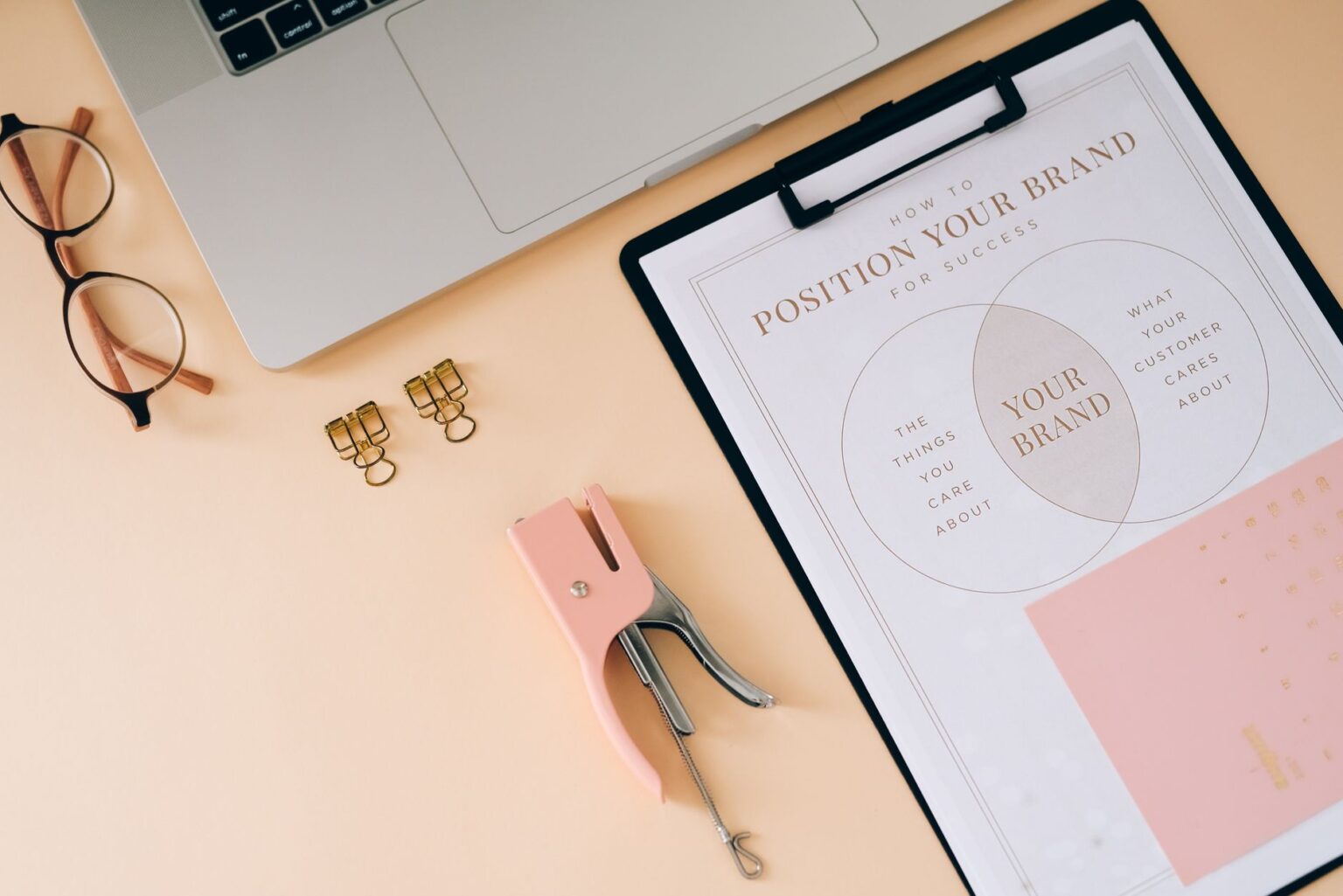 Typeface’s Brand AI Is Quietly Replacing Frontify for Social Teams A designer working at a modern workspace surrounded by brand guidelines and digital screens