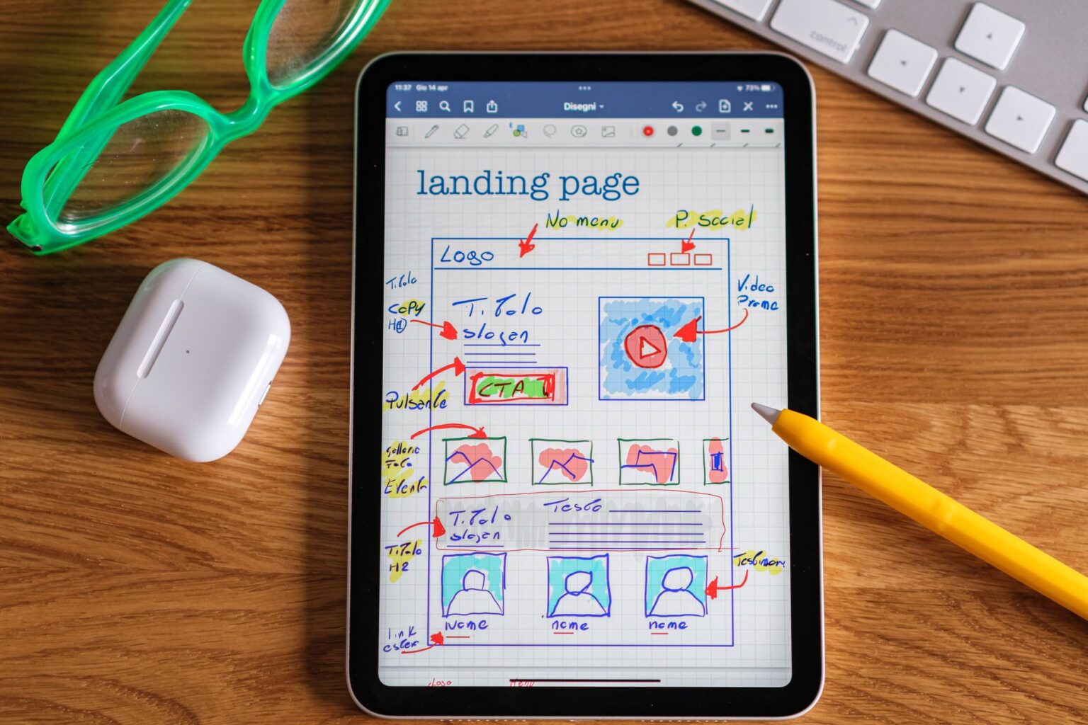 Designer reviewing website sitemap wireframe on a laptop screen