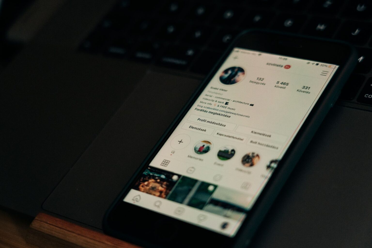 Person browsing a brand's social media profile on a smartphone