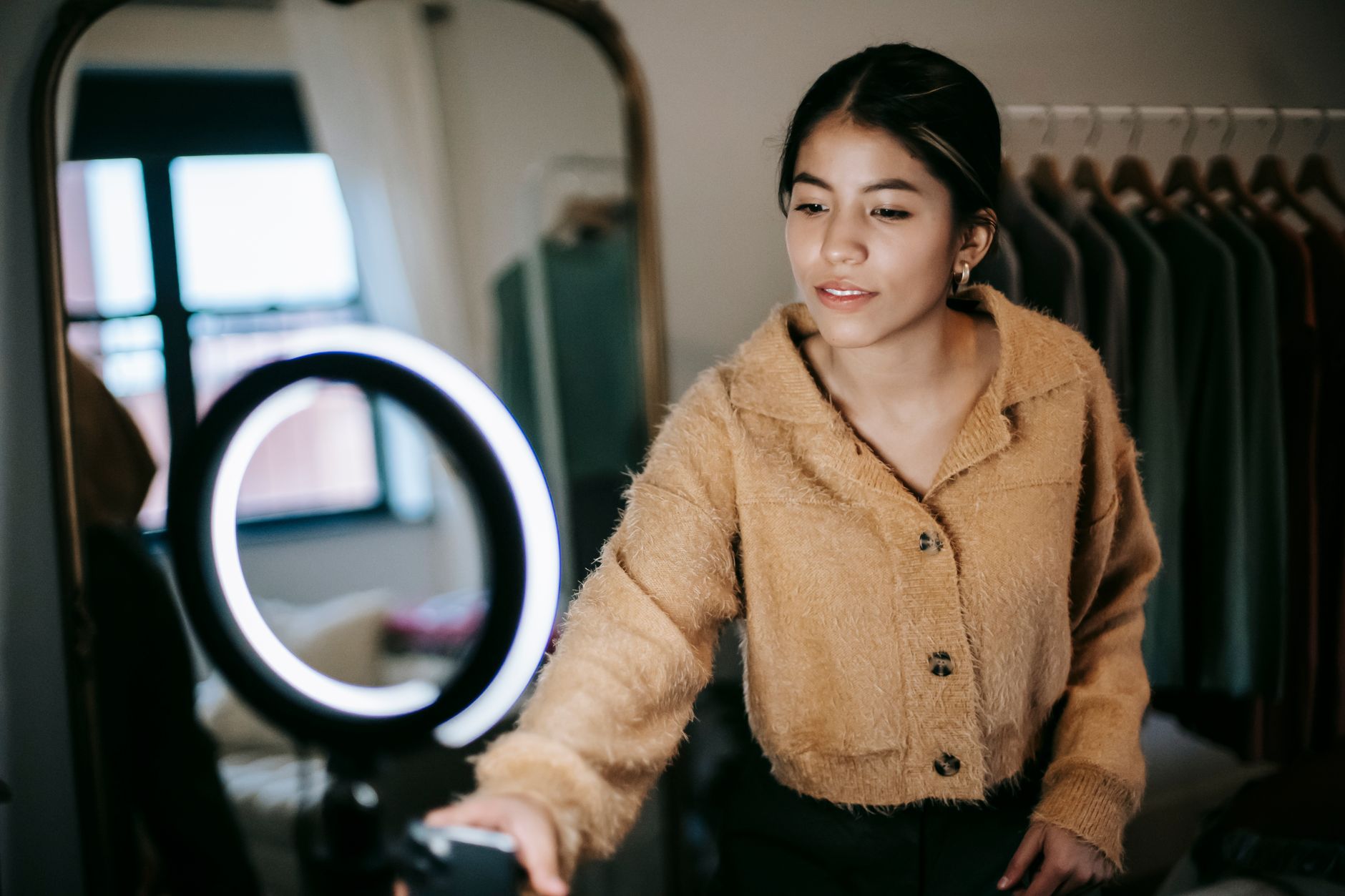 A content creator filming a short-form video for social media